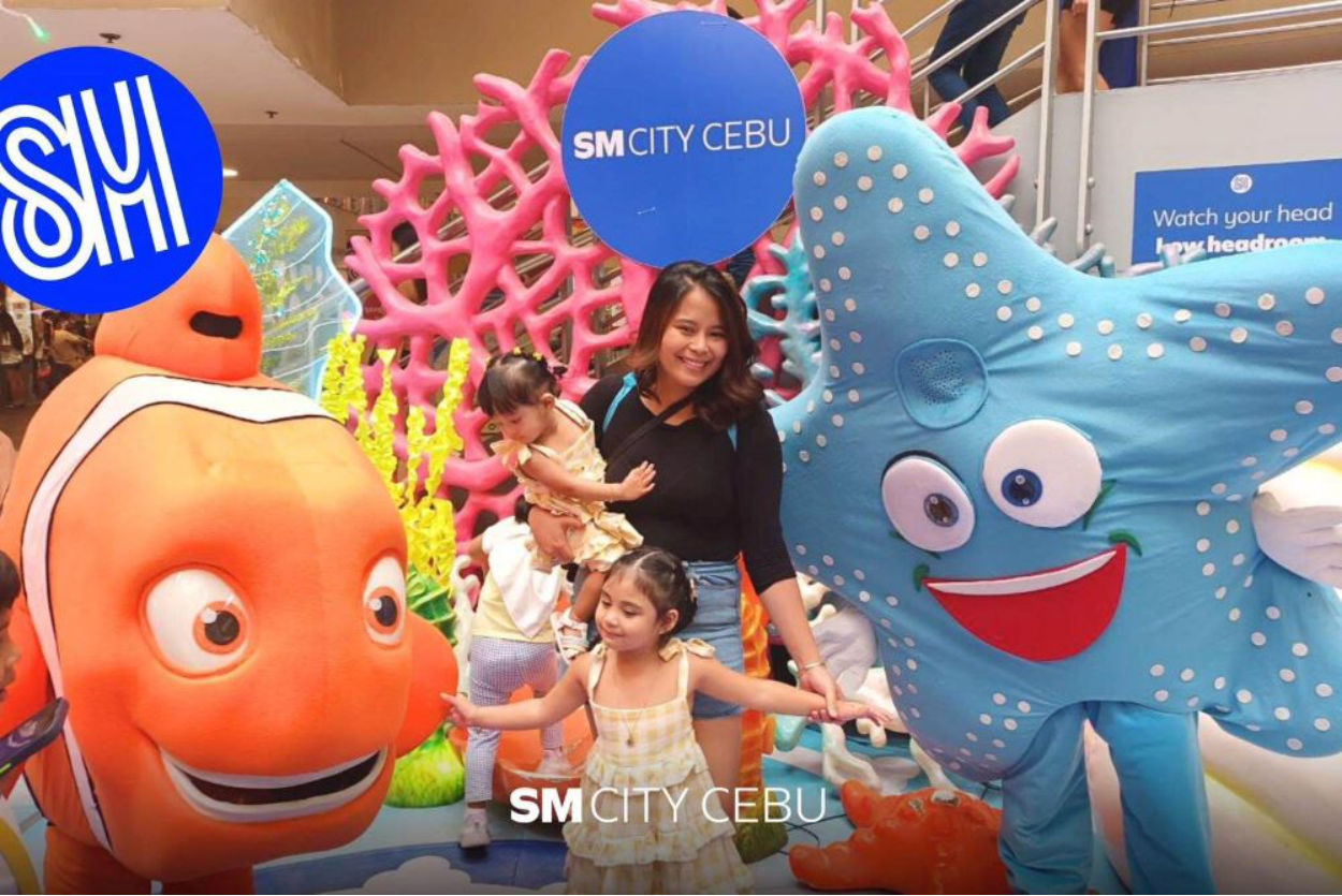 A Mom and her kids having fun with underwater friends at SM City Cebu | SM Supermalls