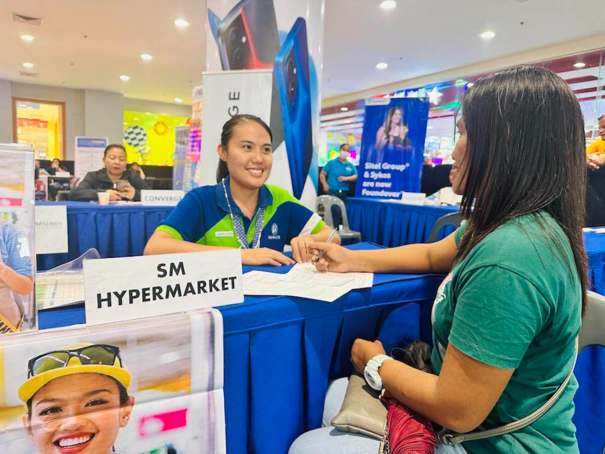 SM Hypermarket representative with an applicant at Job Fair 2023, SM City Rosales | SM Supermalls