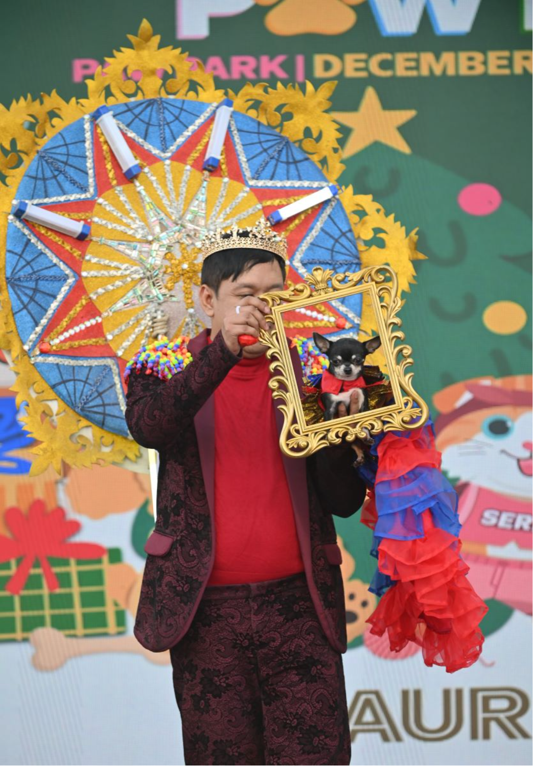 A_pet_dog_dons_a_costume_alongside_its_owner