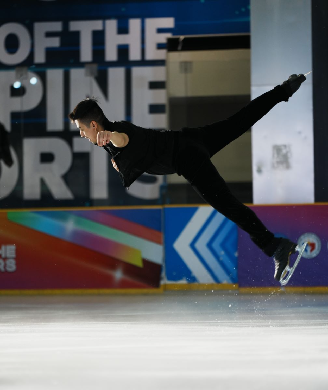 Two_time_Winter_Olympian_Michael_Martinez_commands_the_rink_in_a_captivating_display_of_precision