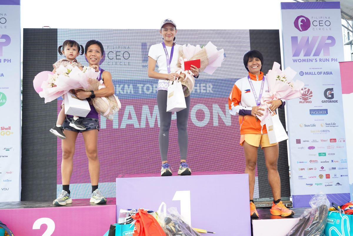 2_The_top_finishers_in_the_10K_category_are_Maria_Jonna_Lina_Abutas_winning_1st_place_center_followed_by_Maricar_Camacho_in_2nd_place_left_and_Jennelyn_Isibido_in_3rd_place