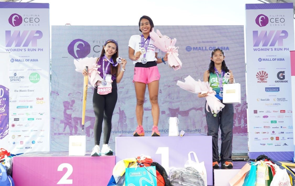 3_In_the_5K_category_Tes_Nocyao_secures_first_place_center_with_Krysha_Anne_Macalalad_taking_2nd_place_left_and_Rhazanica_Sarah_Bautista_finishing_3rd__post_fin