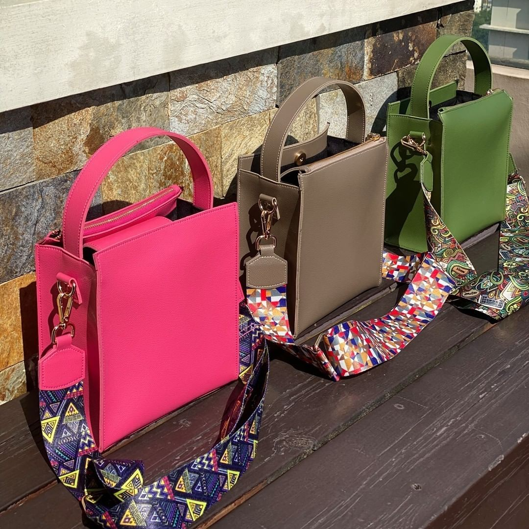 1_Leather_totes_travel_organizers_and_customizable_bag_tags_by_Bags_in_the_City