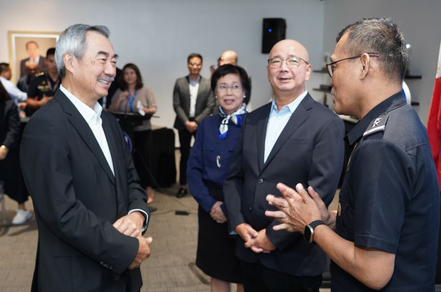3_SM_Prime_Chairman_of_the_Executive_Committee_Hans_Sy_left_discusses_fire_safety_matters_with_Bureau_of_Fire_Protection_Director_Louie_Puracan_right_while_SM_Prime_President_Jeffrey_Lim_second_from_