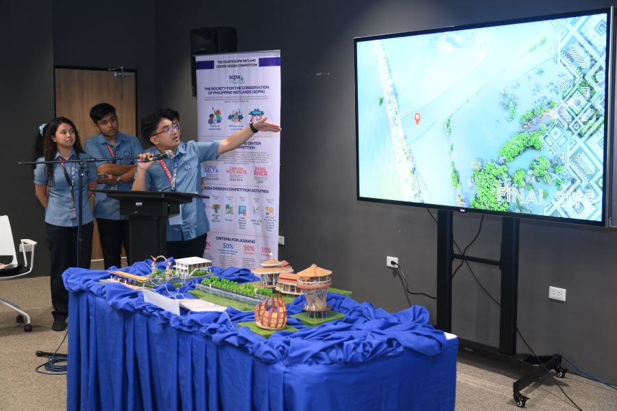 3_The_architecture_students_of_the_National_University_proudly_show_their_wetland_design_called_Talisayan_which_bagged_the_3rd_place_in_the_competition_